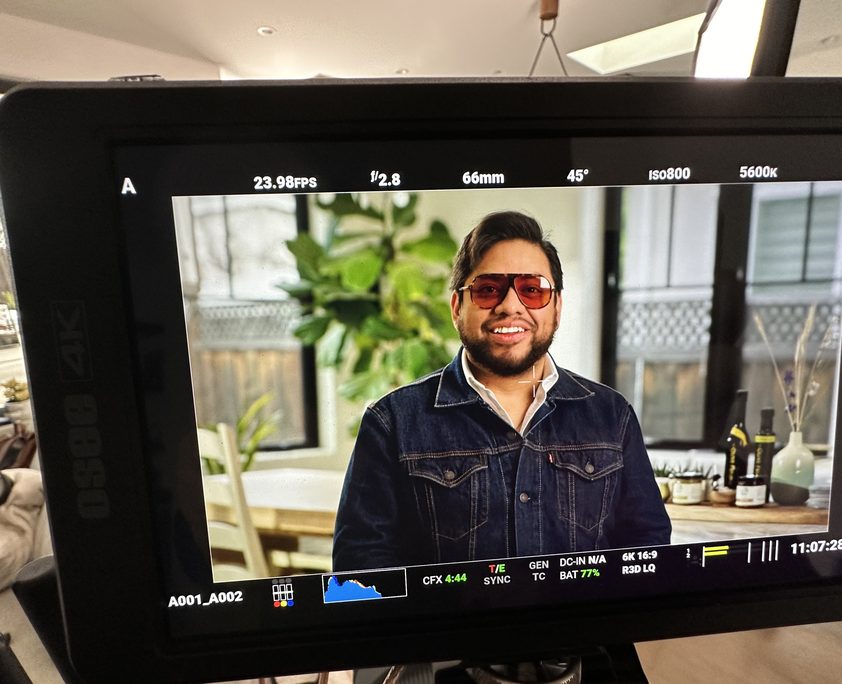 Carlos de León's face on a camera monitor during a video shoot